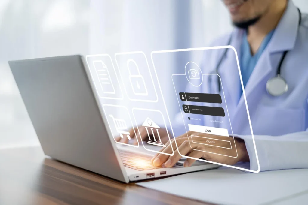 Doctor interacts with a laptop displaying a virtual interface focused on revenue recovery strategies